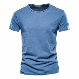 Detail of blue men's slim fit T-shirt showing slub cotton fabric texture and crew neck