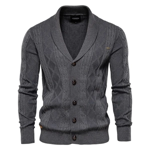 Close-up of the grey knit texture and ribbed shawl collar on this men's cardigan