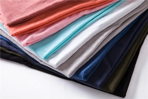 Detail shot of multi-color V-neck T-shirts showing premium knitted fabric texture
