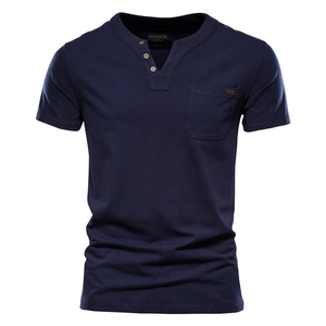 Detail of navy blue cotton Henley T-shirt featuring a V-neck and decorative pocket