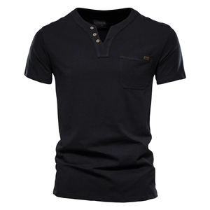 Detail of black cotton Henley T-shirt featuring V-neckline with three buttons and chest pocket