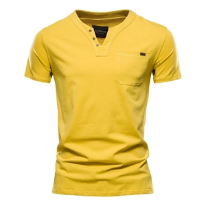 Detail of a bright yellow men's slim fit cotton Henley T-shirt with chest pocket