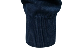 Close-up of the dark blue ribbed cuff showing high-elasticity knit texture and quality
