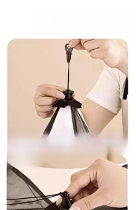 Collapsible mesh food cover with easy-pull top mechanism and decorative lace edging