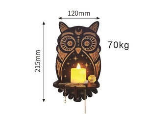 Detail view of owl-shaped wooden wall shelf with candle and jewelry storage dimensions