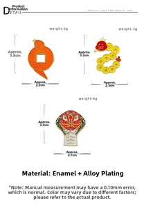 Detail view of colorful snake enamel brooches with sizes and weight specifications
