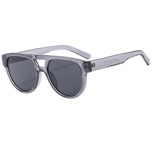 Retro oversized aviator sunglasses with translucent grey frames and dark lenses