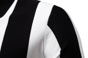 Detailed view of the striped knit polo shirt neckline and high-quality shoulder stitching