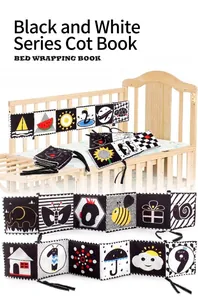 Detail of high-contrast black and white double-sided soft baby book for crib sensory play