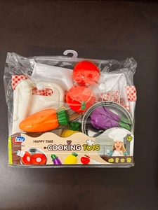 Kids' kitchen role-play toy set with toy pans and colorful pretend play vegetables