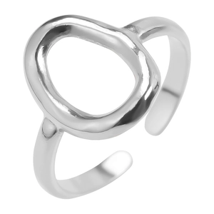 Macro shot of silver open ring with irregular oval cutout and polished metal finish