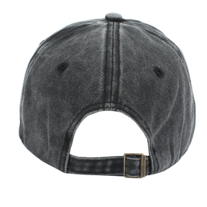 Detail of adjustable bronze metal buckle on washed charcoal grey vintage baseball cap