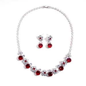 Luxury silver flower jewelry set with red gemstones and sparkling zircon accents