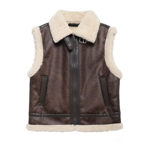 Women's brown faux leather vest with white teddy fleece lining and plush trim edges