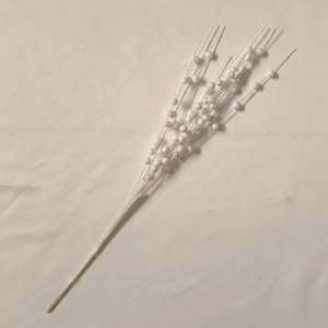 Detailed view of white artificial glitter berry stems for Christmas tree decorations