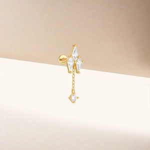 Close-up of S925 hallmark on gold plated sterling silver diamond stud earring