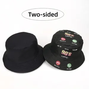 Reversible bucket hat with retro 90s calling print and solid black versatile design