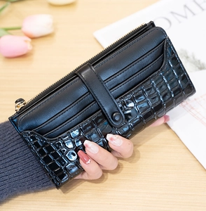 Close-up of stone pattern long wallet with multiple card slots and metal zipper detail