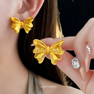 Exquisite 18K gold butterfly filigree earrings for women in luxury hollow design