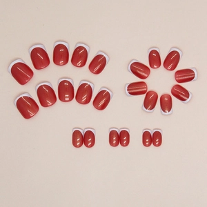 Faux ongles courts œil de chat rouge avec pointes blanches françaises et paillettes