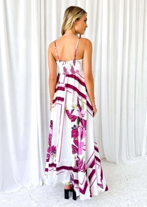 Detail of bohemian floral maxi dress featuring backless design and elasticated straps