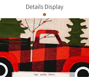 Detail of Christmas table runner featuring red truck and tree applique on burlap fabric