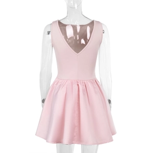 Detail view of pink sleeveless cocktail dress back with a bow and flared satin hemline