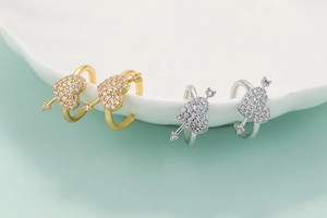 Minimalist heart and arrow ear cuffs with cubic zirconia in gold and silver finish