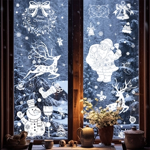 Detailed white Christmas window stickers featuring Santa Claus and reindeer on glass