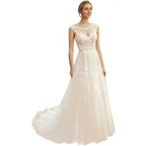 Elegant ivory white bridal gown featuring floral lace embroidery and a long tulle train