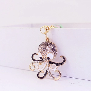 Cute golden octopus keychain with shimmering rhinestones and black enamel accents