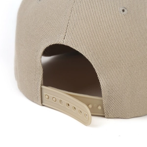 Close-up of khaki baseball cap with adjustable snapback closure and twill texture