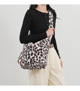 Detail of soft leopard print faux fur tote bag showing texture and large capacity size
