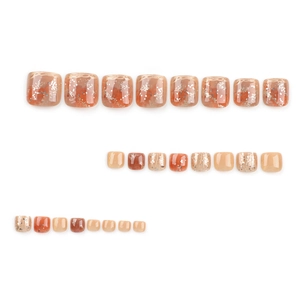 Caramel amber toenail press-on set with marble patterns and shimmering silver glitter