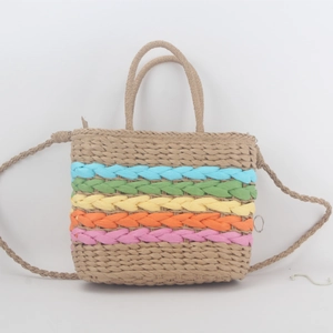 Close-up of rainbow striped straw woven bag with dual handles and shoulder strap
