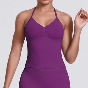 Detailed view of seamless purple v-neck sports bra with gathered texture and high stretch