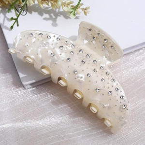 Elegant cream acetate hair claw clip with full rhinestone inlay and pearl texture