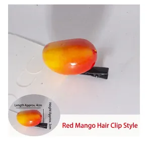 Detailed macro view showing the realistic red mango sprout hair clip and dimensions