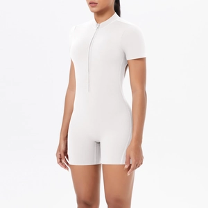 Detailed close-up of white short sleeve bodysuit with high-collar zipper and slim waist design
