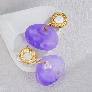 Vintage geometric purple resin earrings with gold wavy accents and shell inlay on a white base