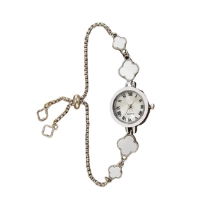 Elegant four-leaf clover bracelet watch with a silver round dial and pull-chain design