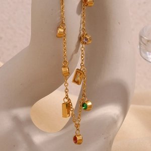 Macro view of 18K gold plated necklace with colorful round and rectangular cubic zirconia