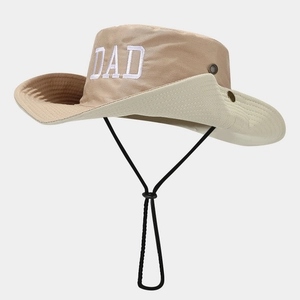 Détail d'un chapeau de soleil extérieur avec broderie DAD et œillets métalliques