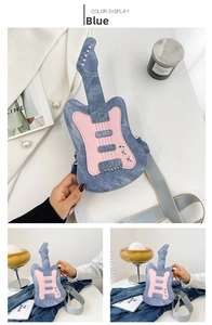 Close-up of guitar-shaped crossbody bag in blue denim with star stud details
