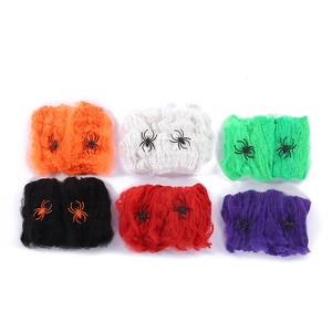 Set of six colorful Halloween spider webs with plastic spiders for outdoor party decoration
