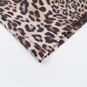 Macro shot of leopard print bikini hem with professional double-stitched parallel seams