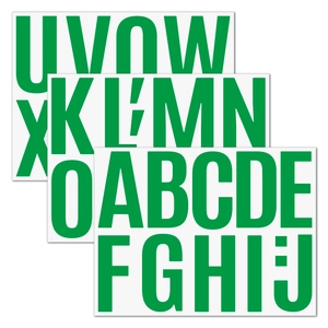 Detail showing bright green 4-inch vinyl alphabet stickers with sharp edges on white surface