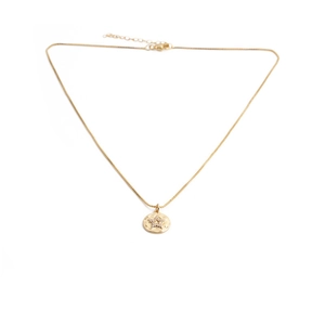 Detail of gold necklace with star pendant and lobster clasp on white background