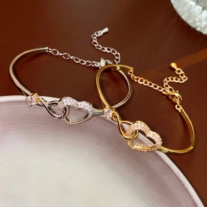 Elegant zircon heart-shaped open bracelets in silver and gold with hollow metal design