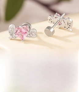Detail of pink zircon heart stud earring with titanium steel post and disc back